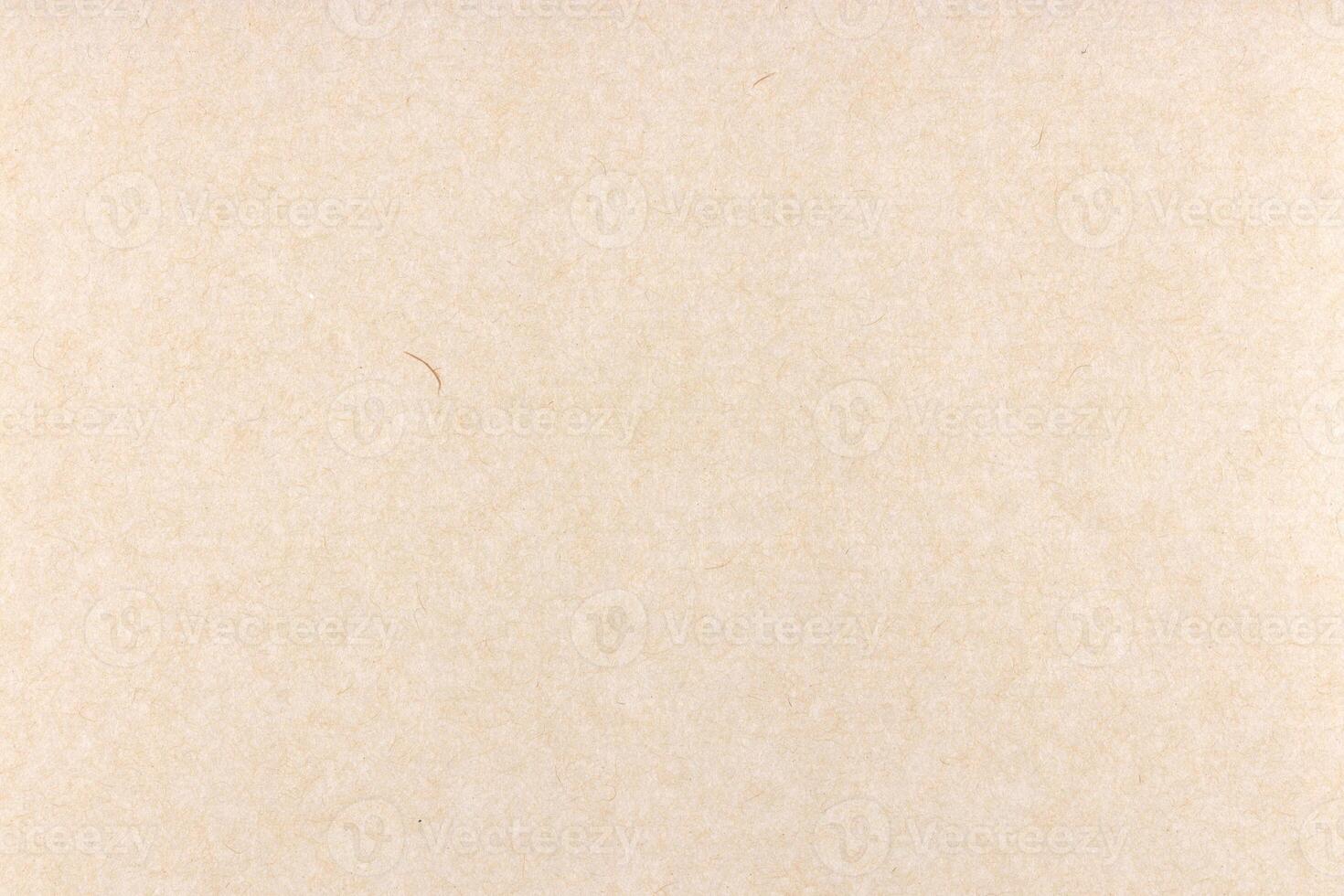 Decorative cream kraft paper texture. Decorated handmade craft paper background. Landscape horizontal orientation. photo
