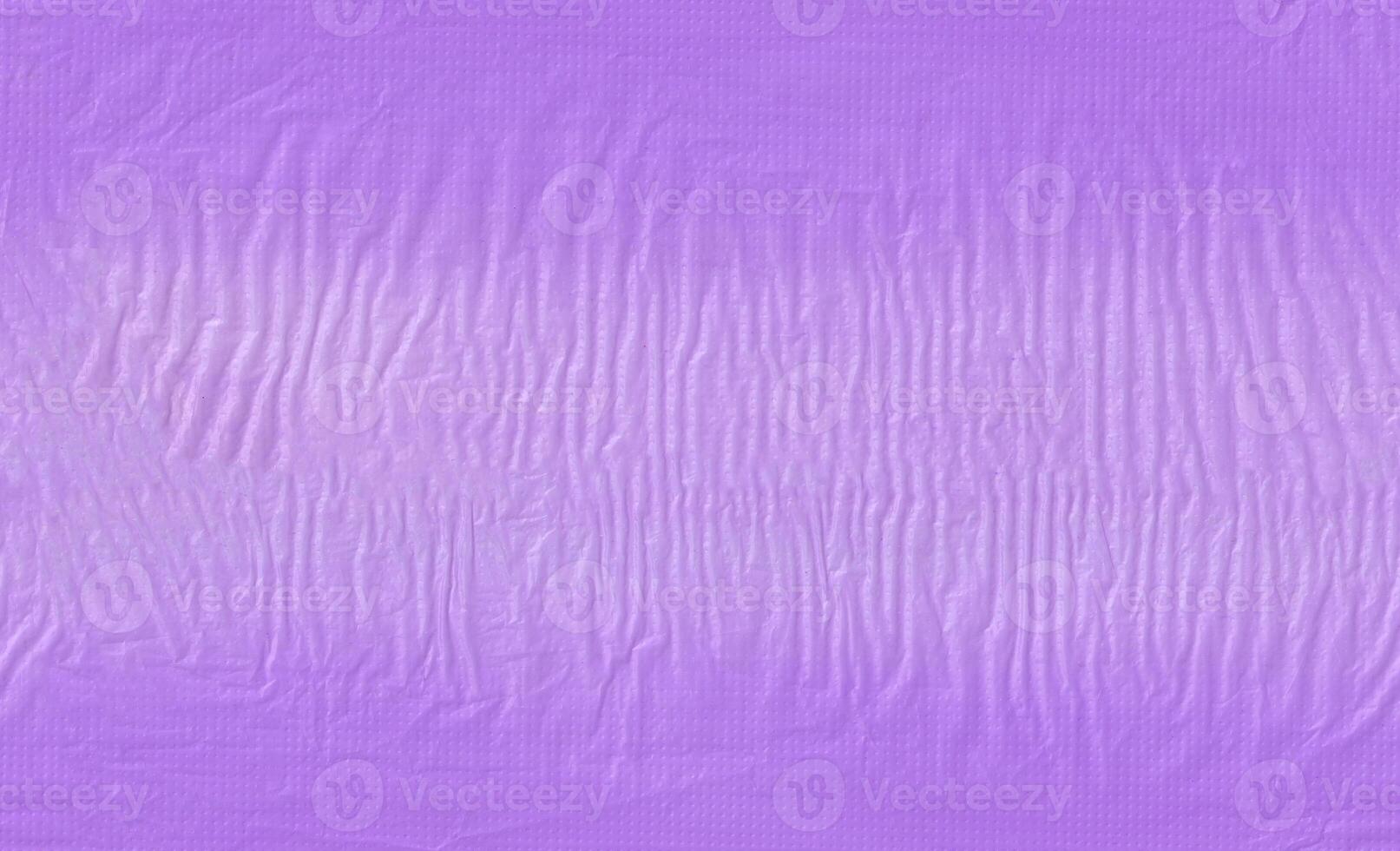 Seamless violet used wrap recycle plastic texture background. photo