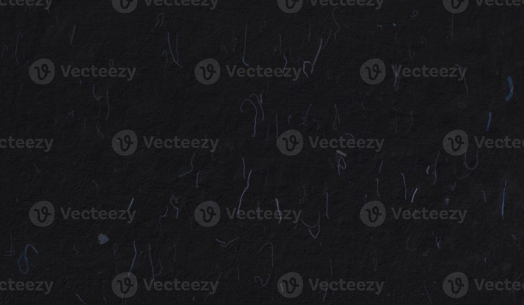 Kraft unique organic black paper texture with detailed blue fibers. photo