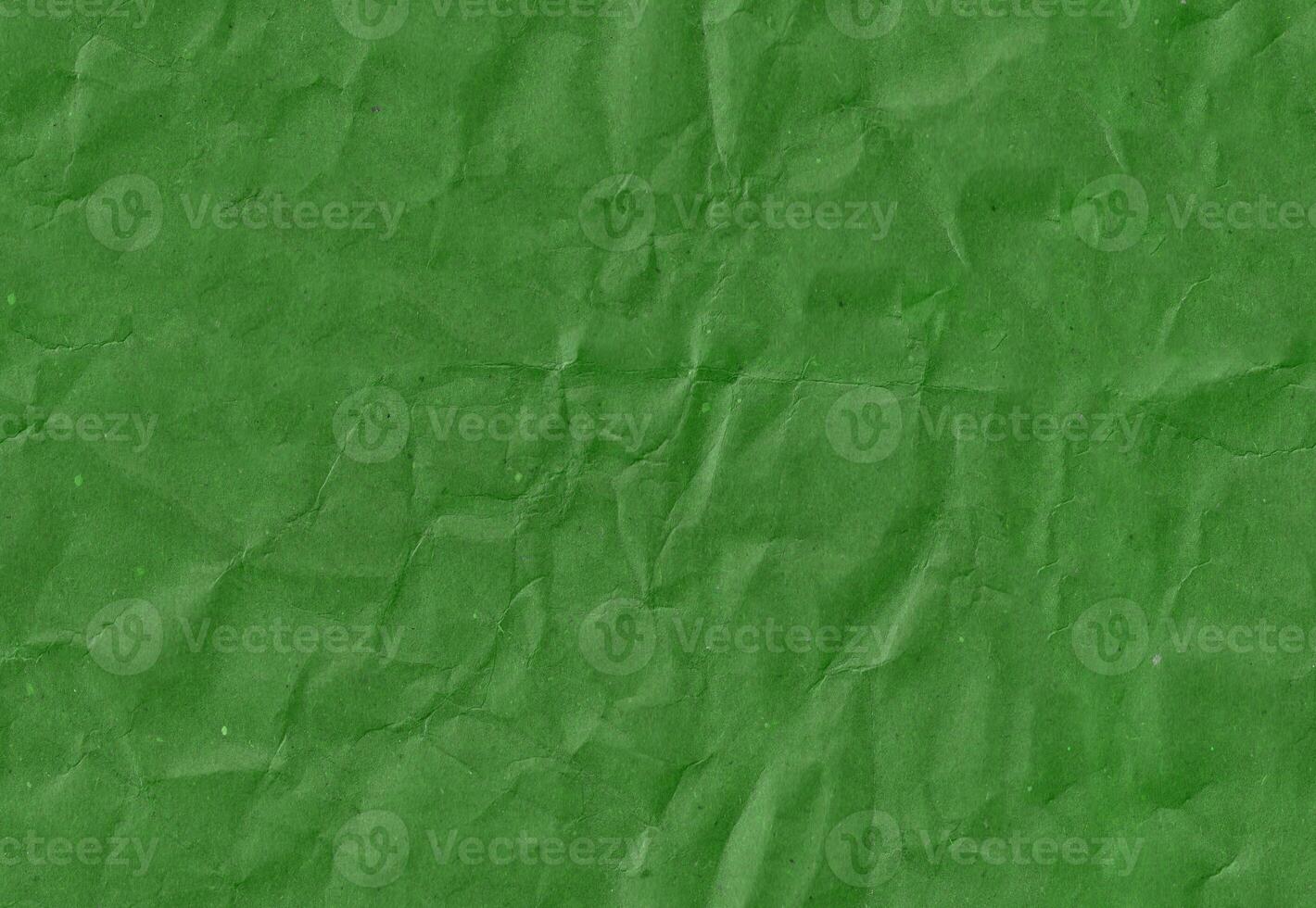 Seamless battered dark green kraft paper texture. Grunge rough natural page. photo