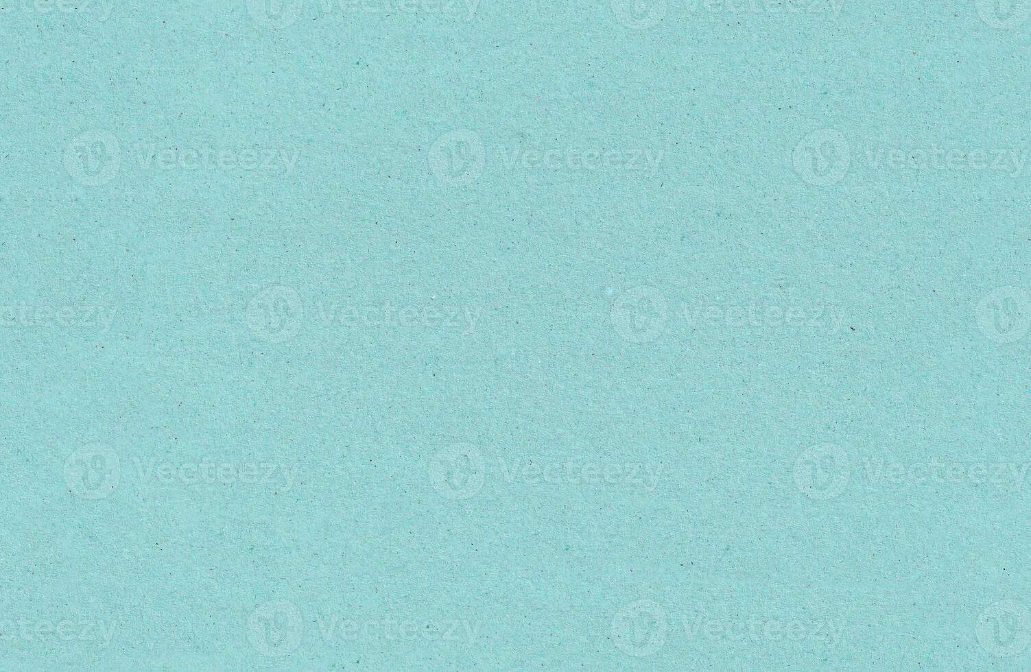 Seamless carton dark sky blue craft paper texture. Recycling beige page. photo