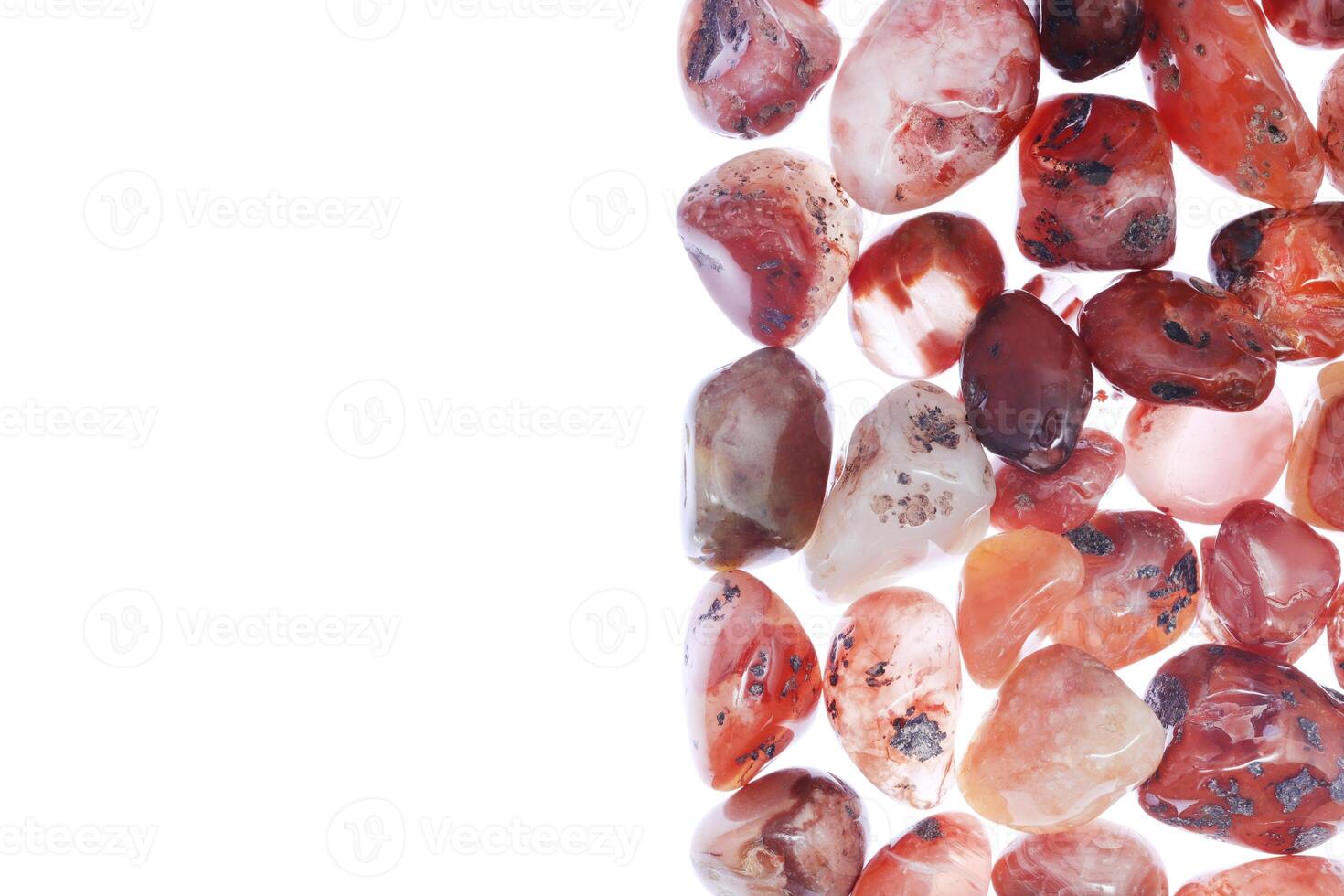 South onyx heap jewel stones texture on half white light isolated background. Place for text. photo