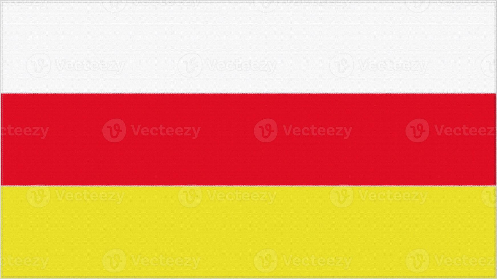 North Ossetia embroidery flag. Emblem stitched fabric. Embroidered coat of arms. Country symbol textile background. photo