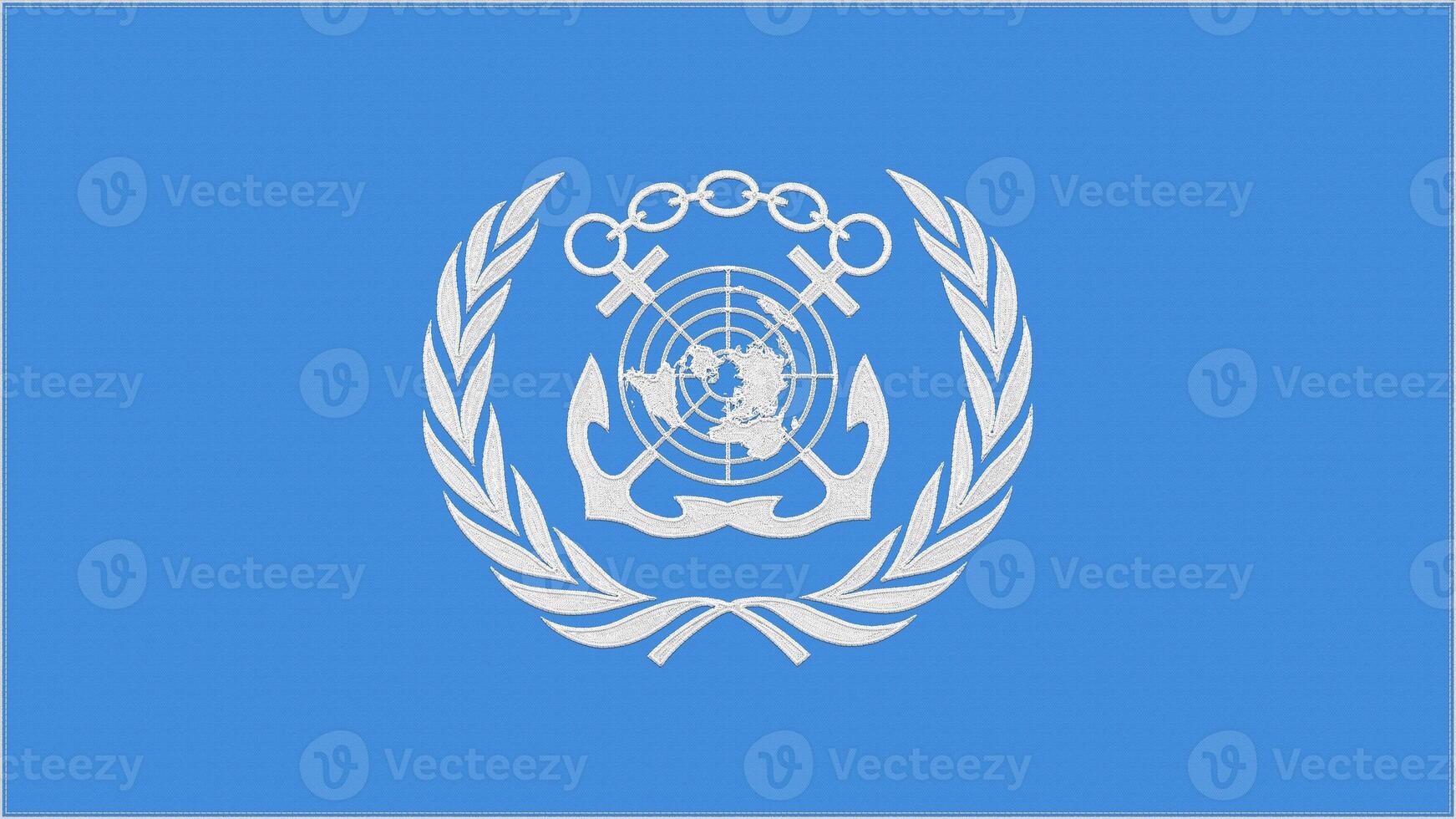 IMO - International Maritime Organization embroidery flag. Emblem stitched fabric. Embroidered coat of arms. Country symbol textile background. photo