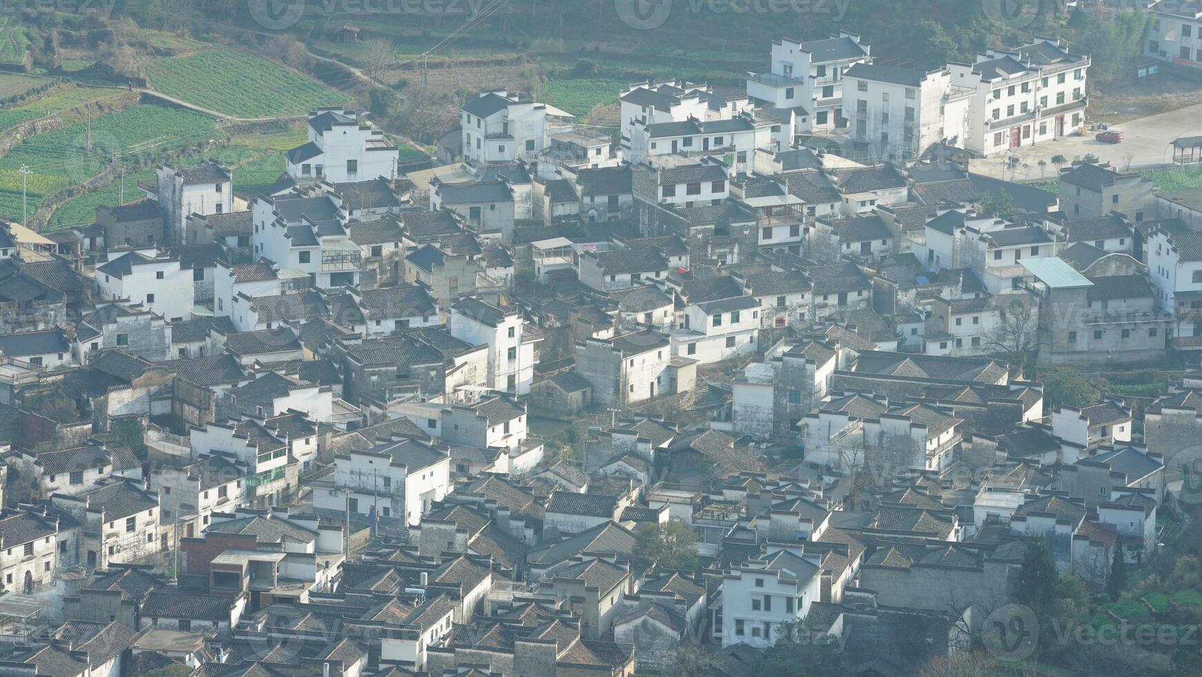 The beautiful mountains landscapes with the green forest and little village as background in the countryside of the China photo