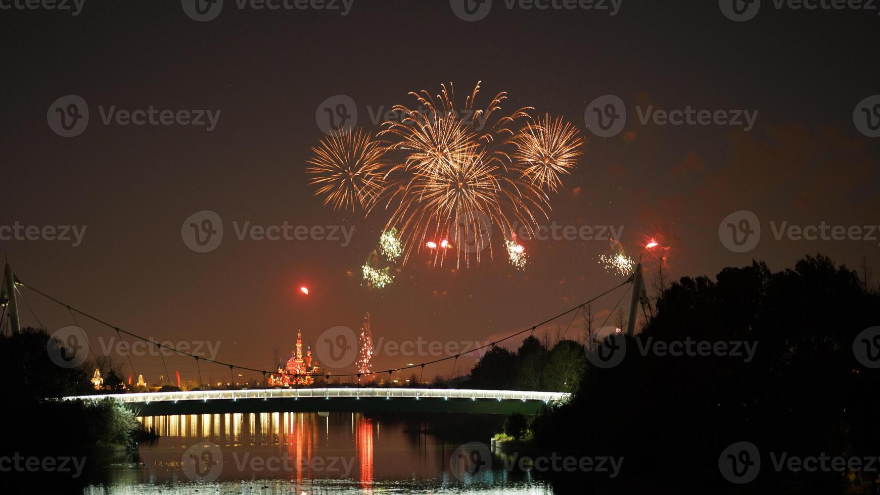 The colorful and beautiful fireworks show with the dark sky as background at night photo