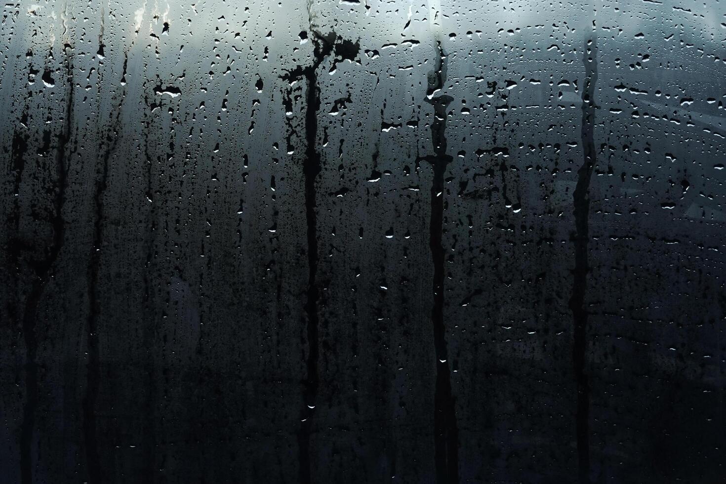 Window Rain, A serene blend of water and glass, Raindrops on Abstract Textured Glass photo