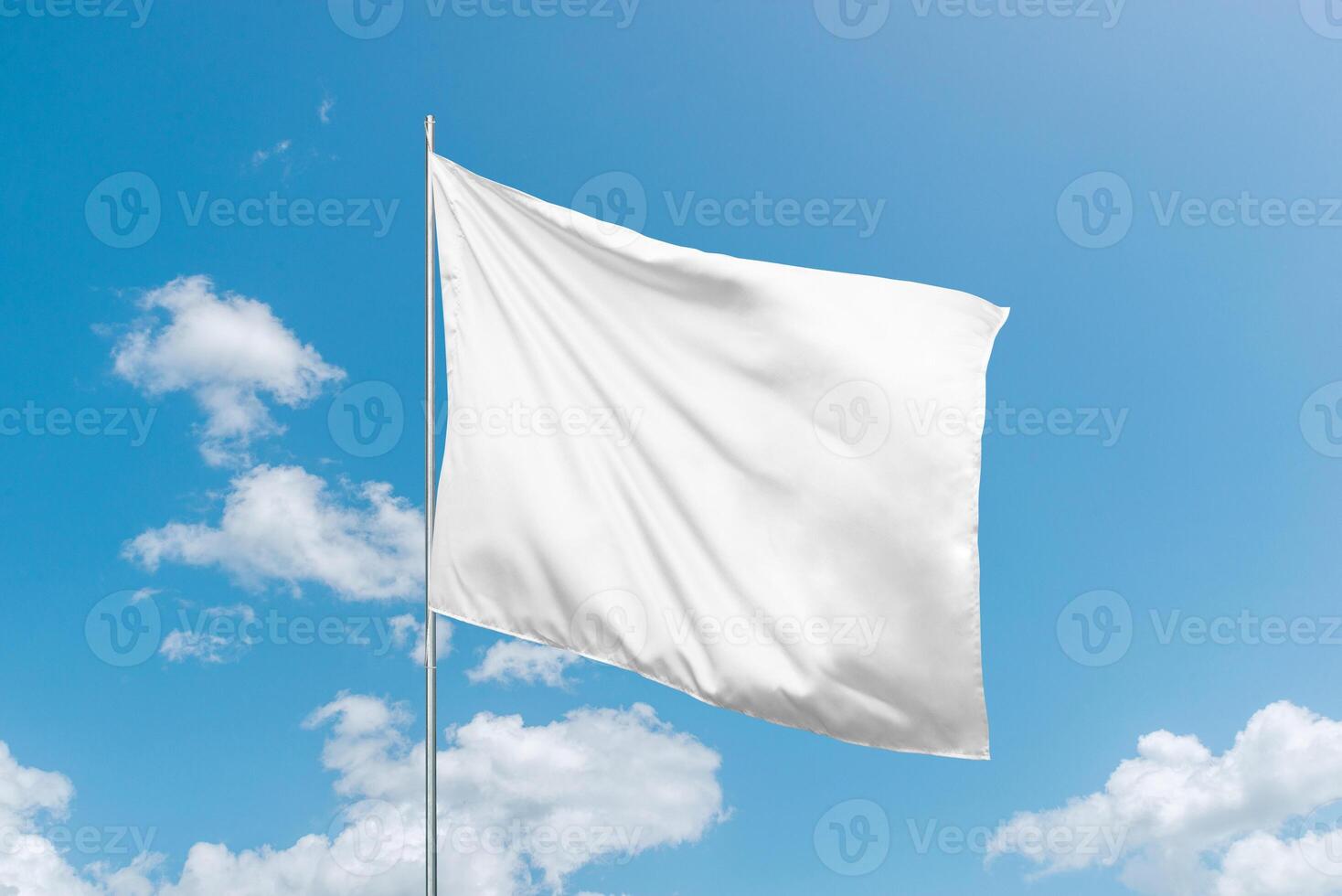 White flag mockup in the wind, perfect for national flag or design presentations and advertising with a clean, blank surface photo