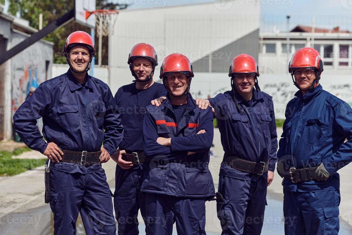 A team of confident and accomplished firefighters strides purposefully in their uniforms, exuding pride and satisfaction after successfully completing a challenging firefighting mission photo