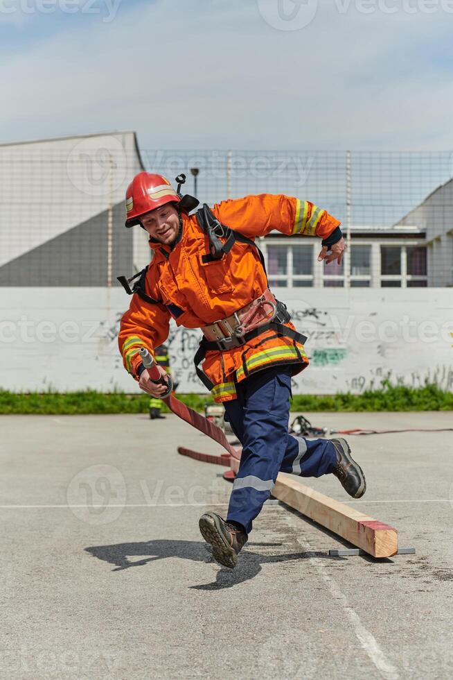 Firefighter Training and Preparing in Professional Gear for Job Hazards photo