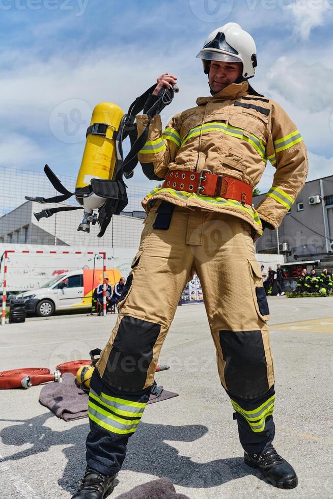 A firefighter dons the essential components of their professional gear, embodying resilience, commitment, and readiness as they gear up for a hazardous firefighting mission, a testament to their photo