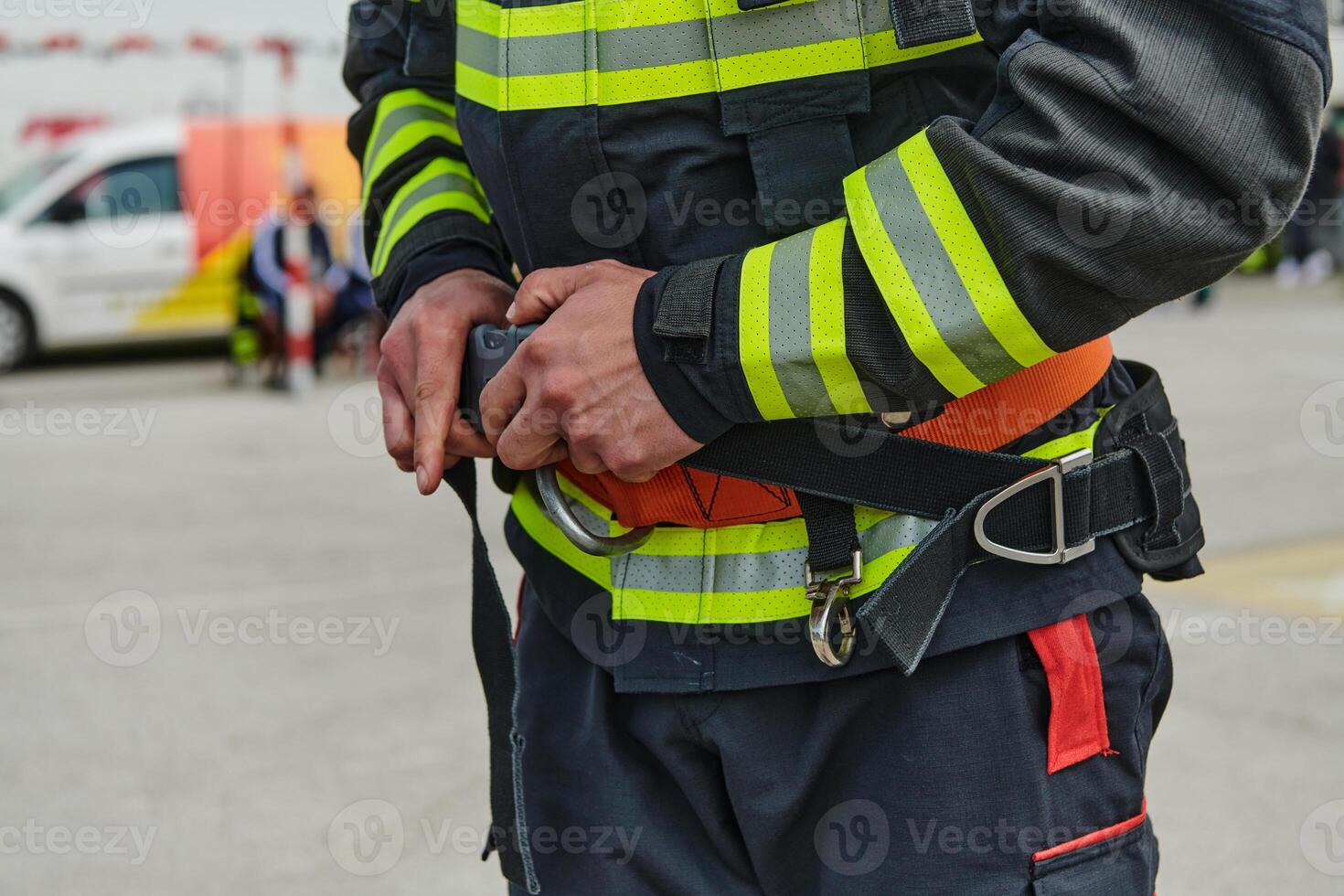 Professional Firefighter Suits Up in Full Gear for Duty photo