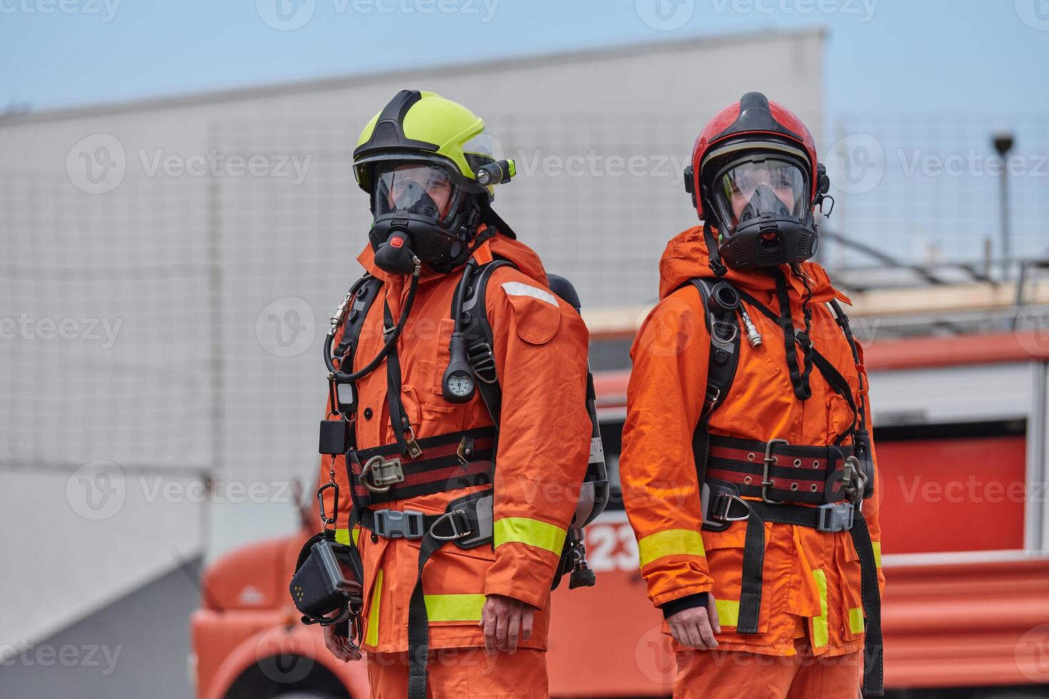 Firefighter Team Training with Various Tools in Professional Gear photo