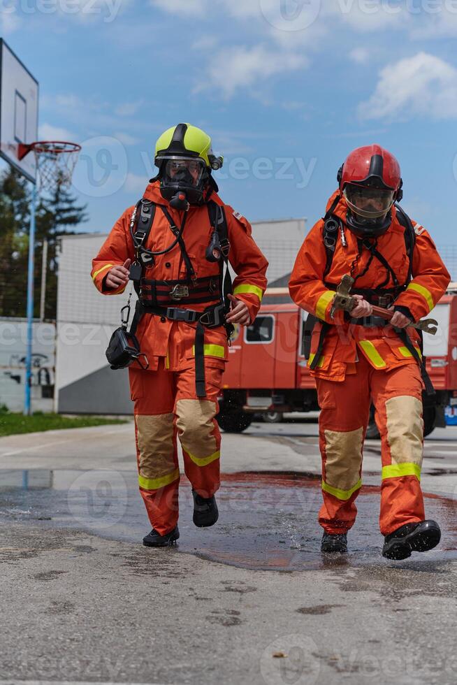 A team of confident and accomplished firefighters strides purposefully in their uniforms, exuding pride and satisfaction after successfully completing a challenging firefighting mission photo