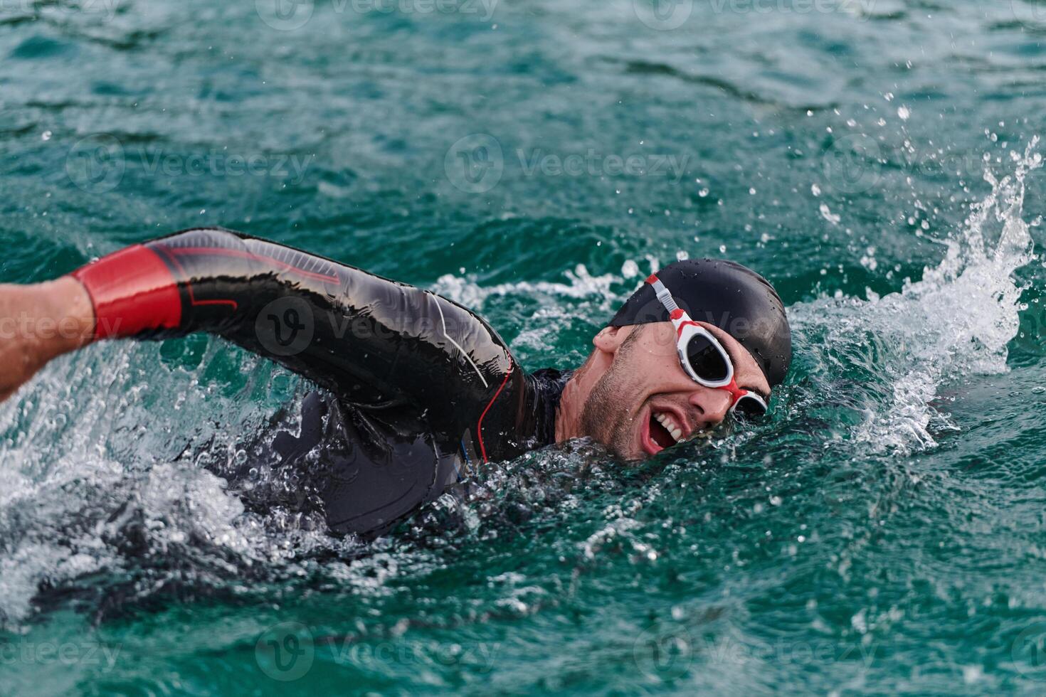 A professional triathlete trains with unwavering dedication for an upcoming competition at a lake, emanating a sense of athleticism and profound commitment to excellence. photo