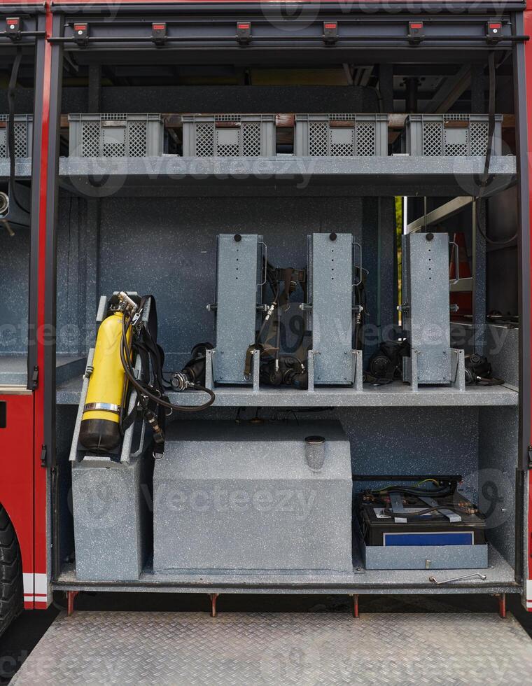Close-up of essential firefighting equipment on a modern firetruck, showcasing tools and gear ready for emergency response to hazardous fire situations photo