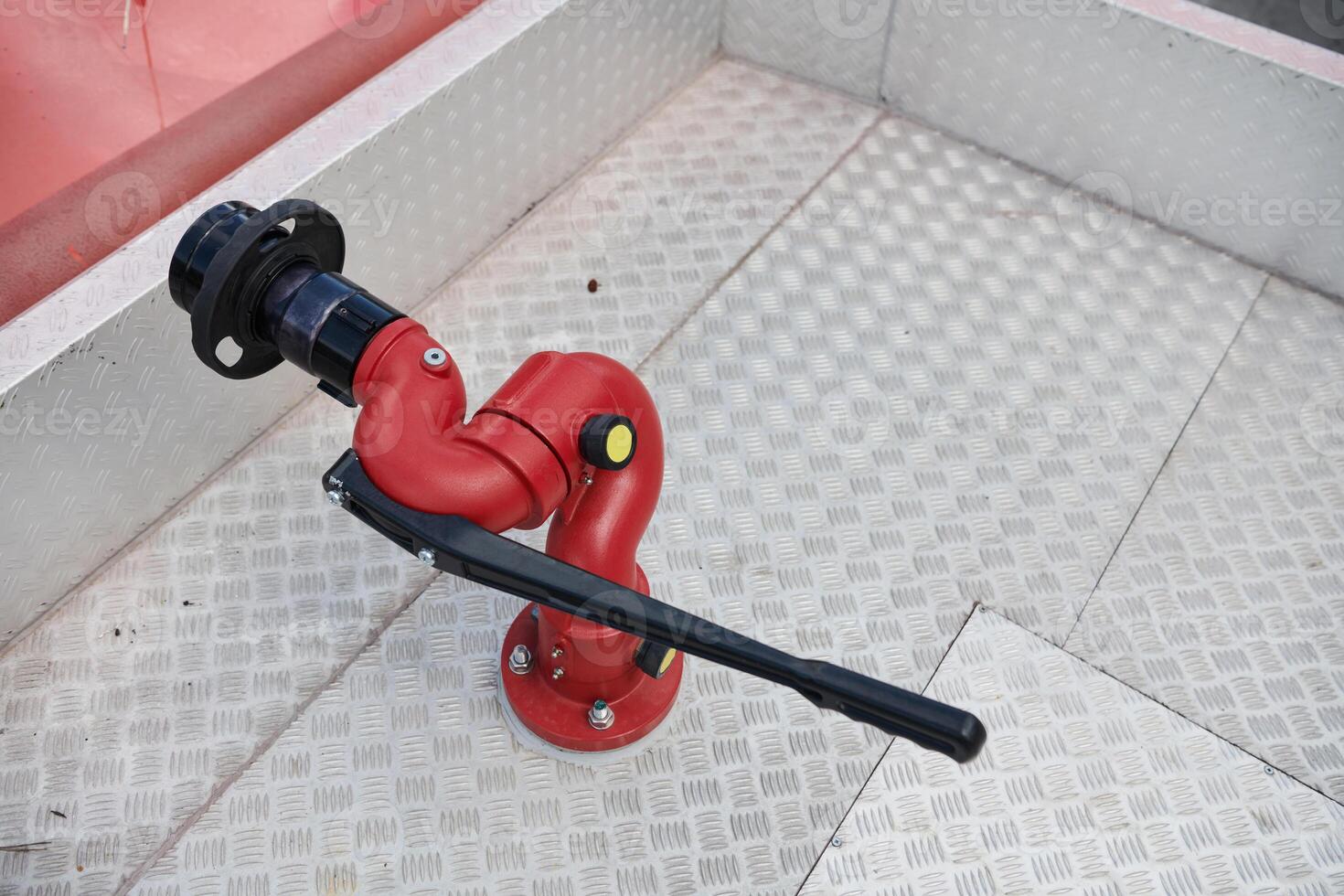 Close-up of essential firefighting equipment on a modern firetruck, showcasing tools and gear ready for emergency response to hazardous fire situations photo