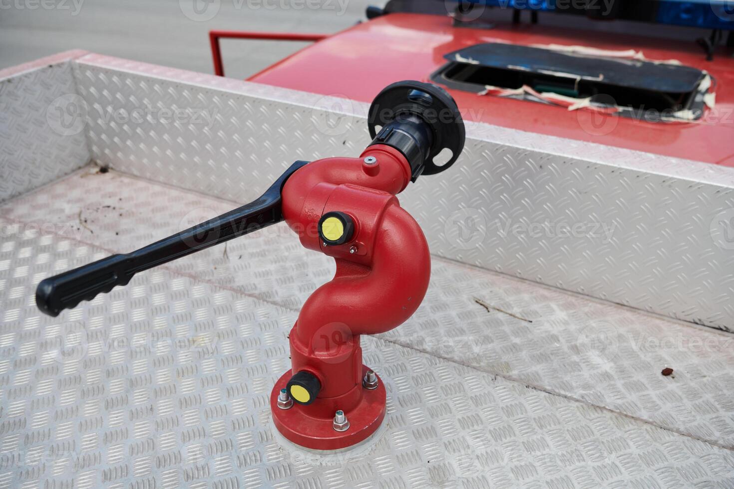 Close-up of essential firefighting equipment on a modern firetruck, showcasing tools and gear ready for emergency response to hazardous fire situations photo