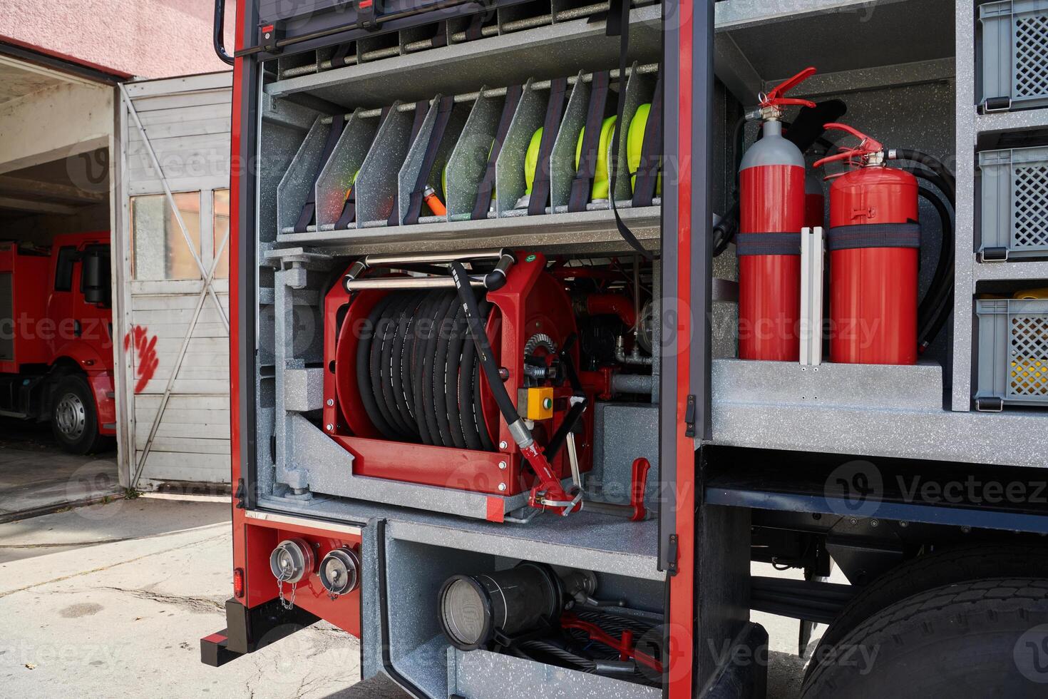 Close-up of essential firefighting equipment on a modern firetruck, showcasing tools and gear ready for emergency response to hazardous fire situations photo
