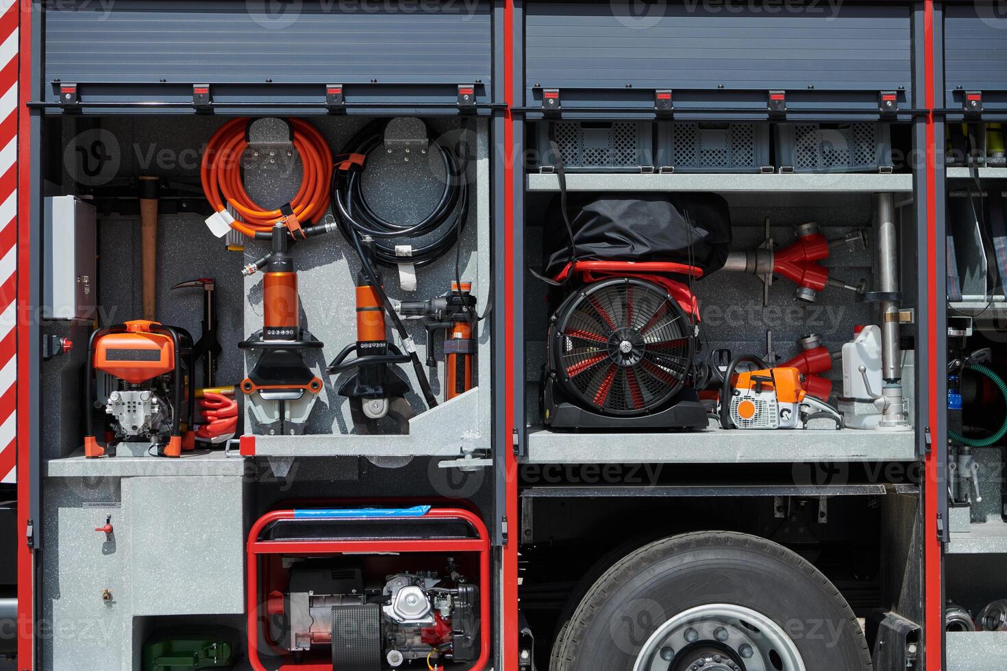 Close-up of essential firefighting equipment on a modern firetruck, showcasing tools and gear ready for emergency response to hazardous fire situations photo