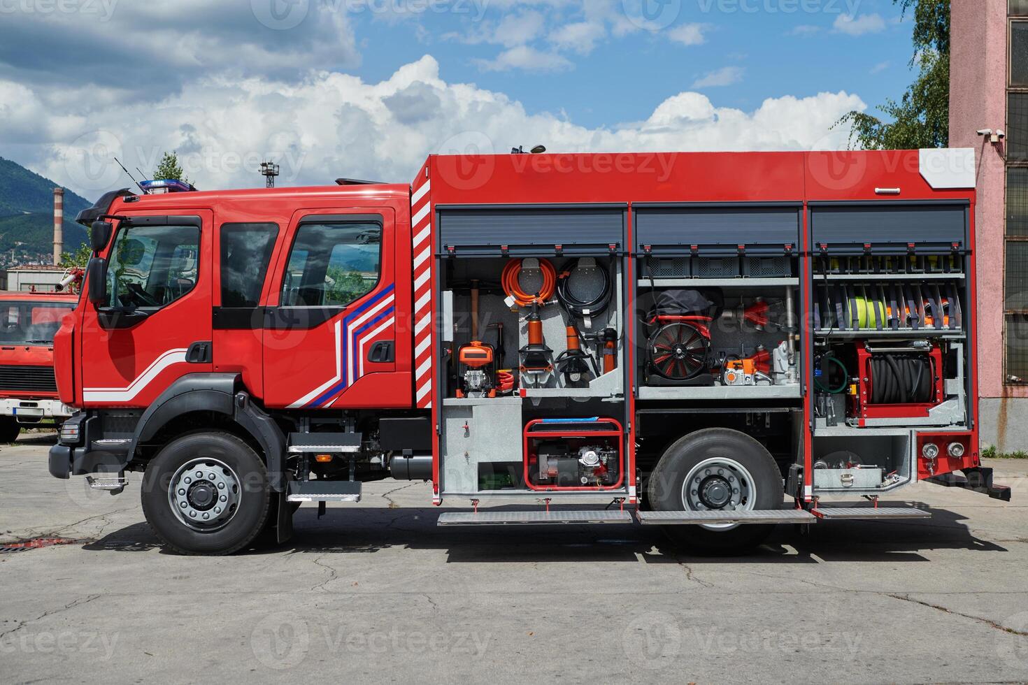 Close-up of essential firefighting equipment on a modern firetruck, showcasing tools and gear ready for emergency response to hazardous fire situations photo