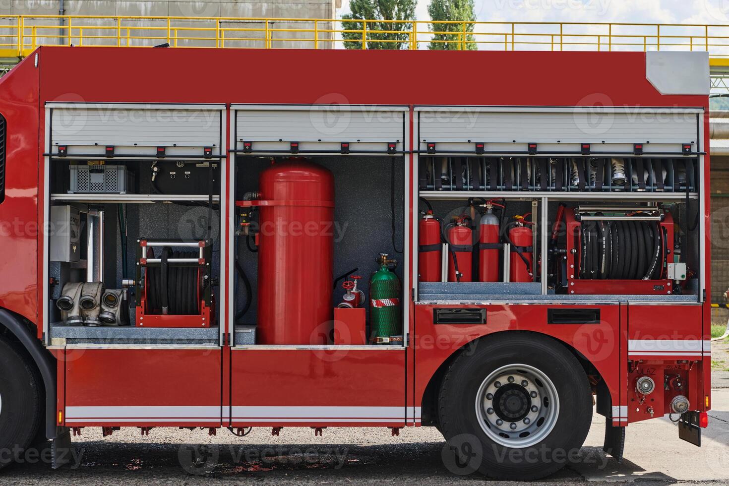 Close-up of essential firefighting equipment on a modern firetruck, showcasing tools and gear ready for emergency response to hazardous fire situations photo