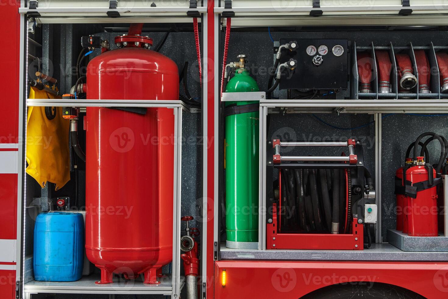 Close-up of essential firefighting equipment on a modern firetruck, showcasing tools and gear ready for emergency response to hazardous fire situations photo