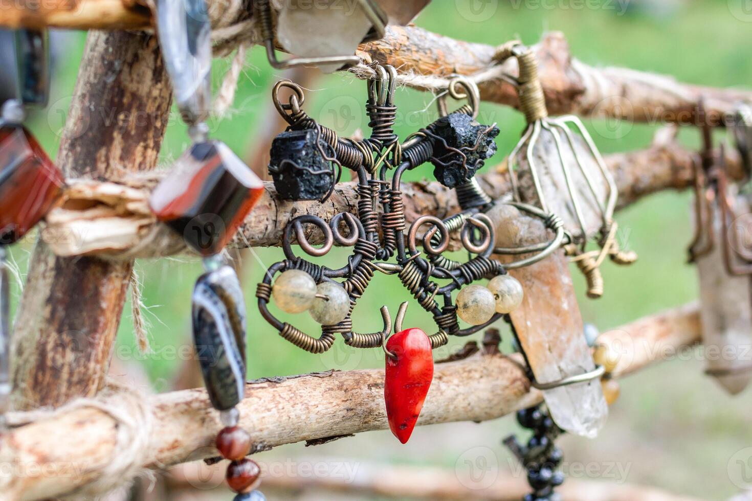 Handmade craft jewelry from metal and natural stones. Handcraft precious item. Jewelry accessories. photo