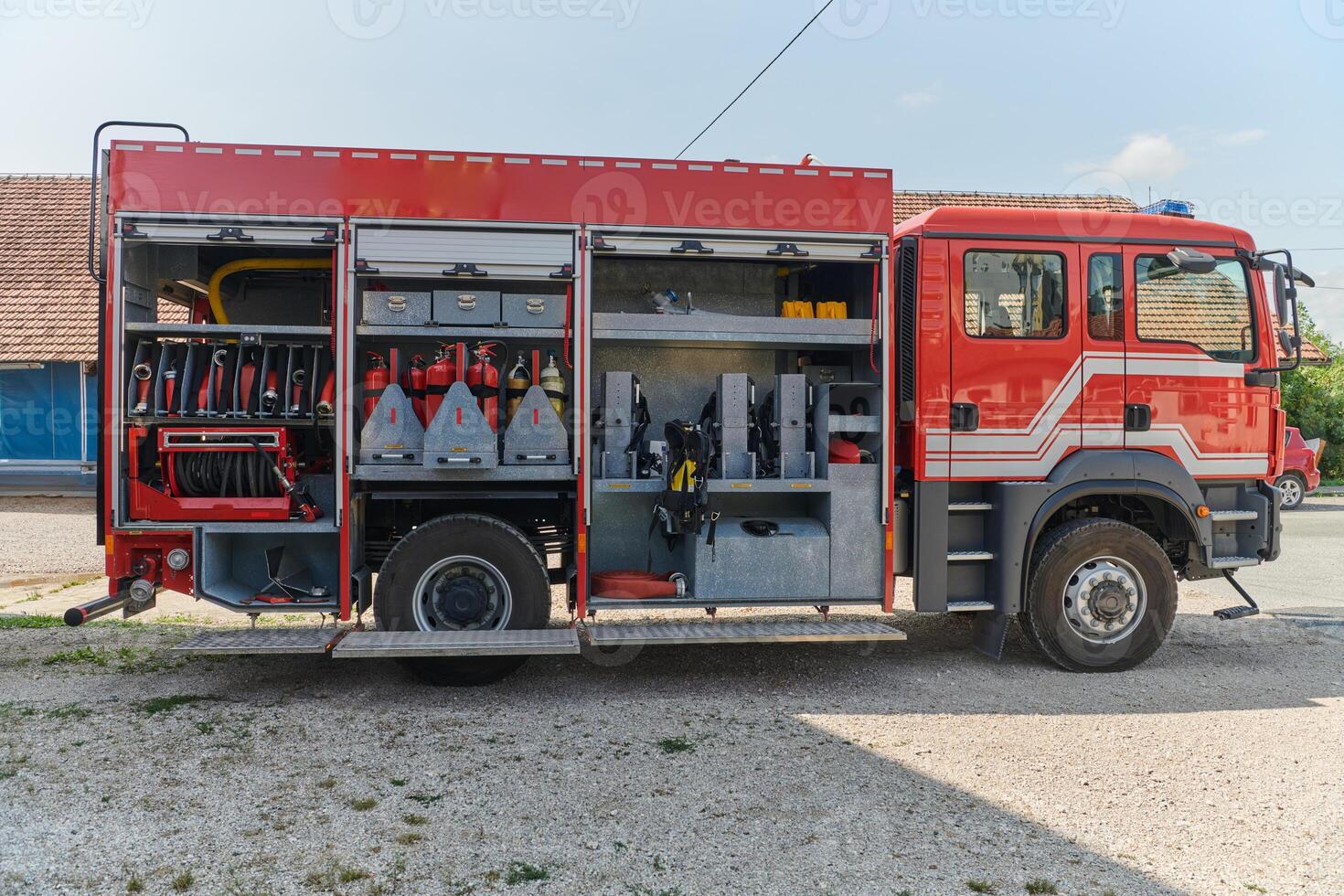 Close-up of essential firefighting equipment on a modern firetruck, showcasing tools and gear ready for emergency response to hazardous fire situations photo