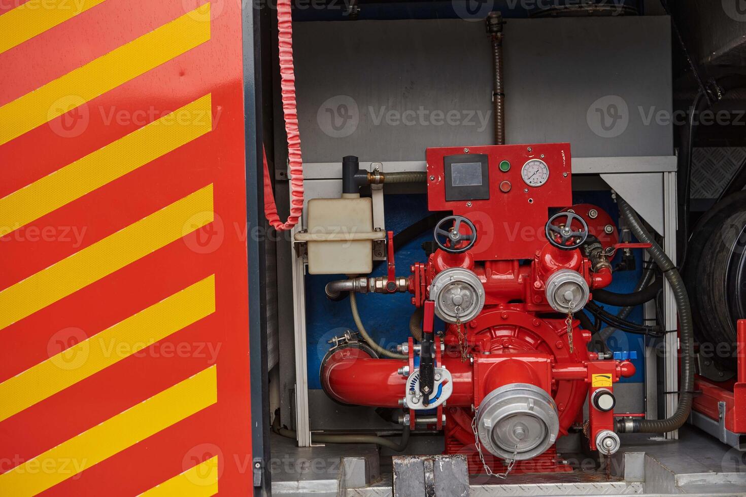 Close-up of essential firefighting equipment on a modern firetruck, showcasing tools and gear ready for emergency response to hazardous fire situations photo