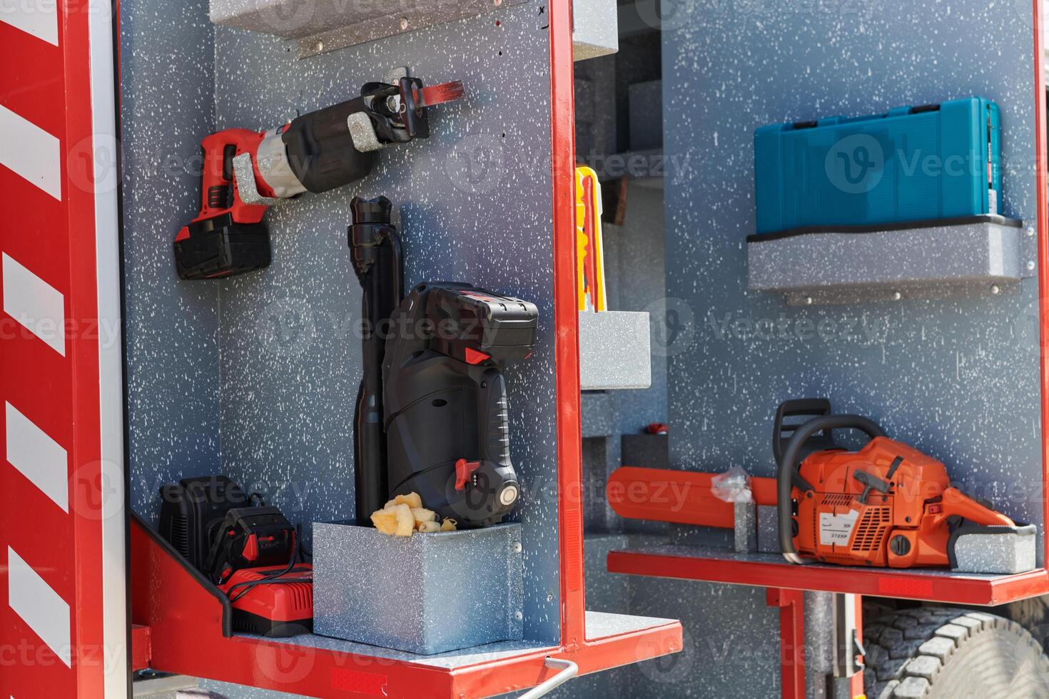 Close-up of essential firefighting equipment on a modern firetruck, showcasing tools and gear ready for emergency response to hazardous fire situations photo