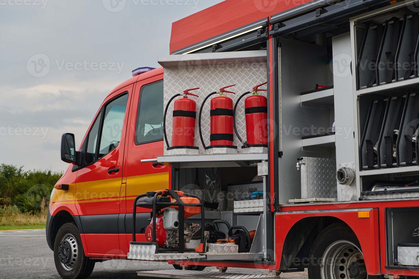 Close-up of essential firefighting equipment on a modern firetruck, showcasing tools and gear ready for emergency response to hazardous fire situations photo