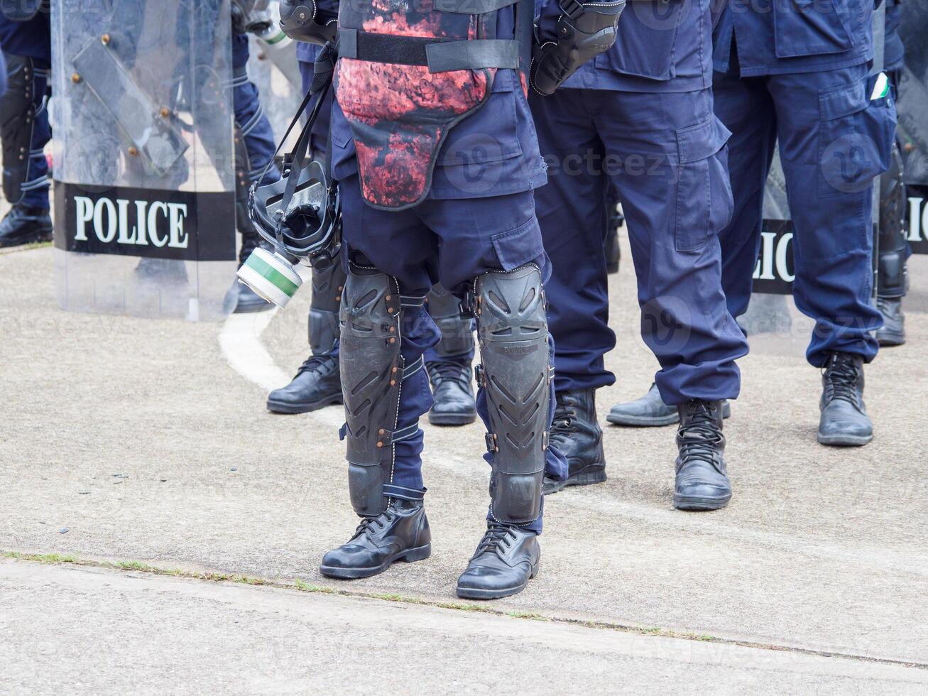 Riot police practice shields and baton photo