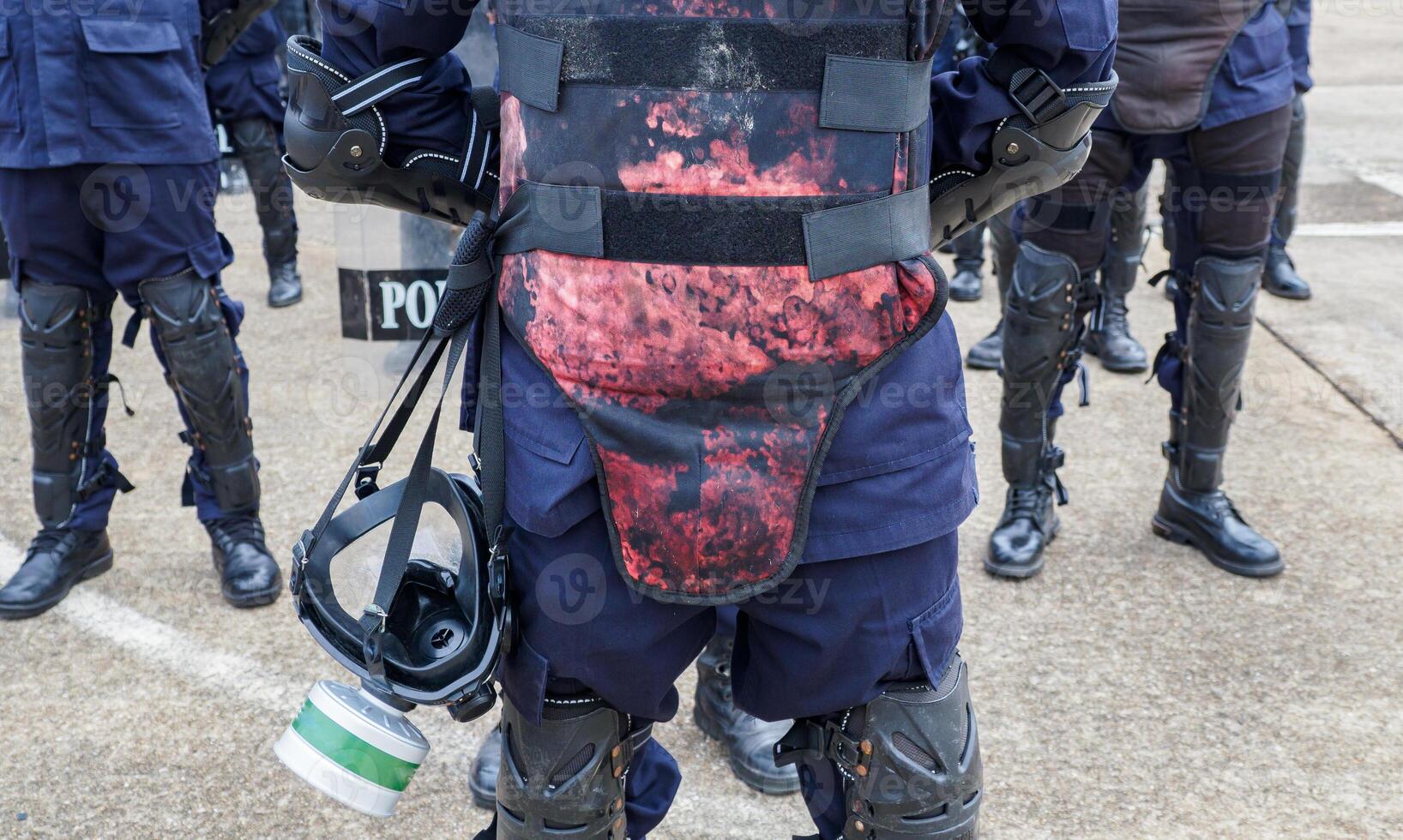 Riot police practice shields and baton photo