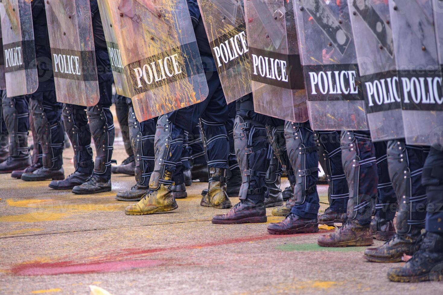 Riot police control the crowd.. photo