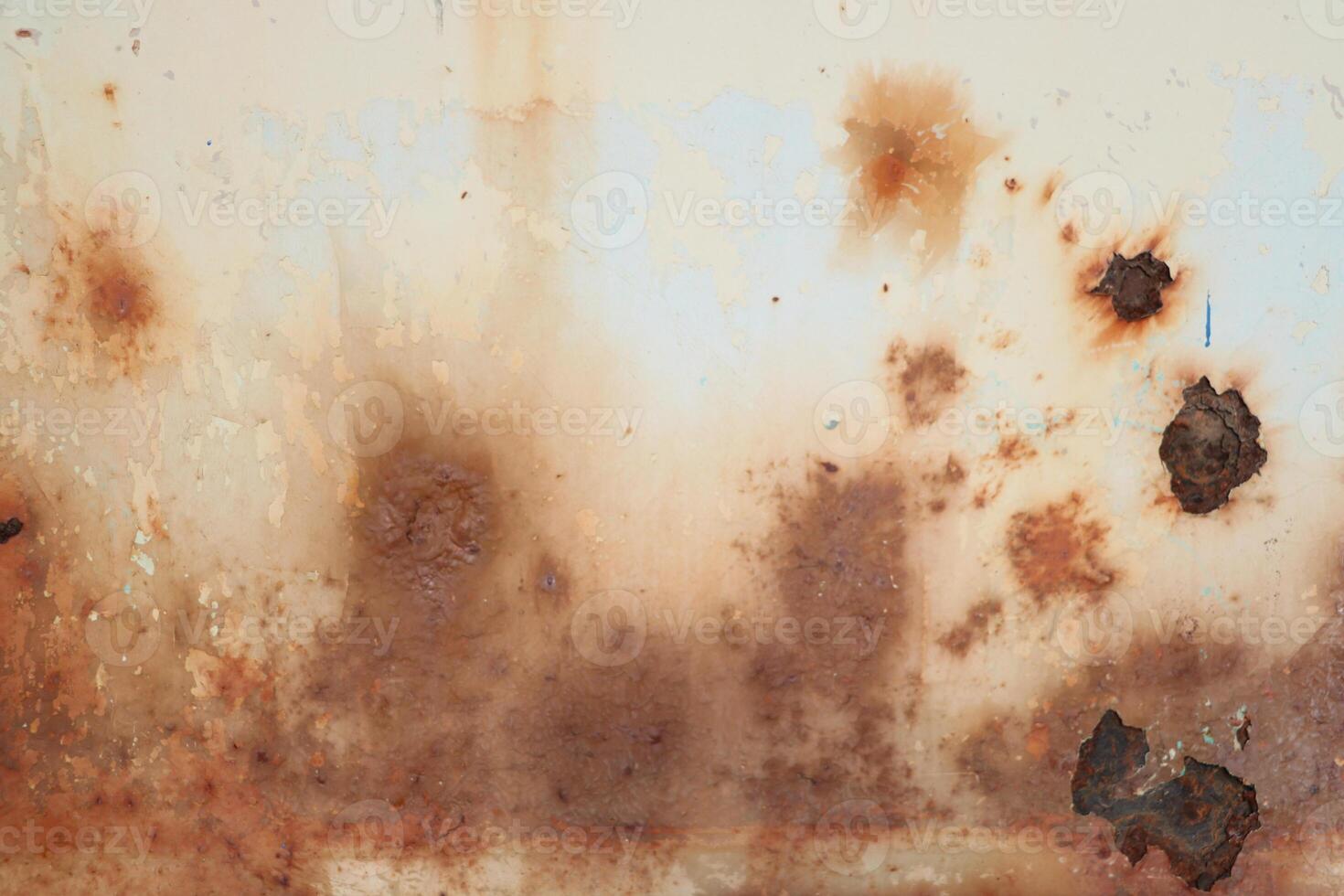 Corroded metal background. Rusted grey painted metal wall. Rusty metal background with streaks of rust. Rust stains. photo
