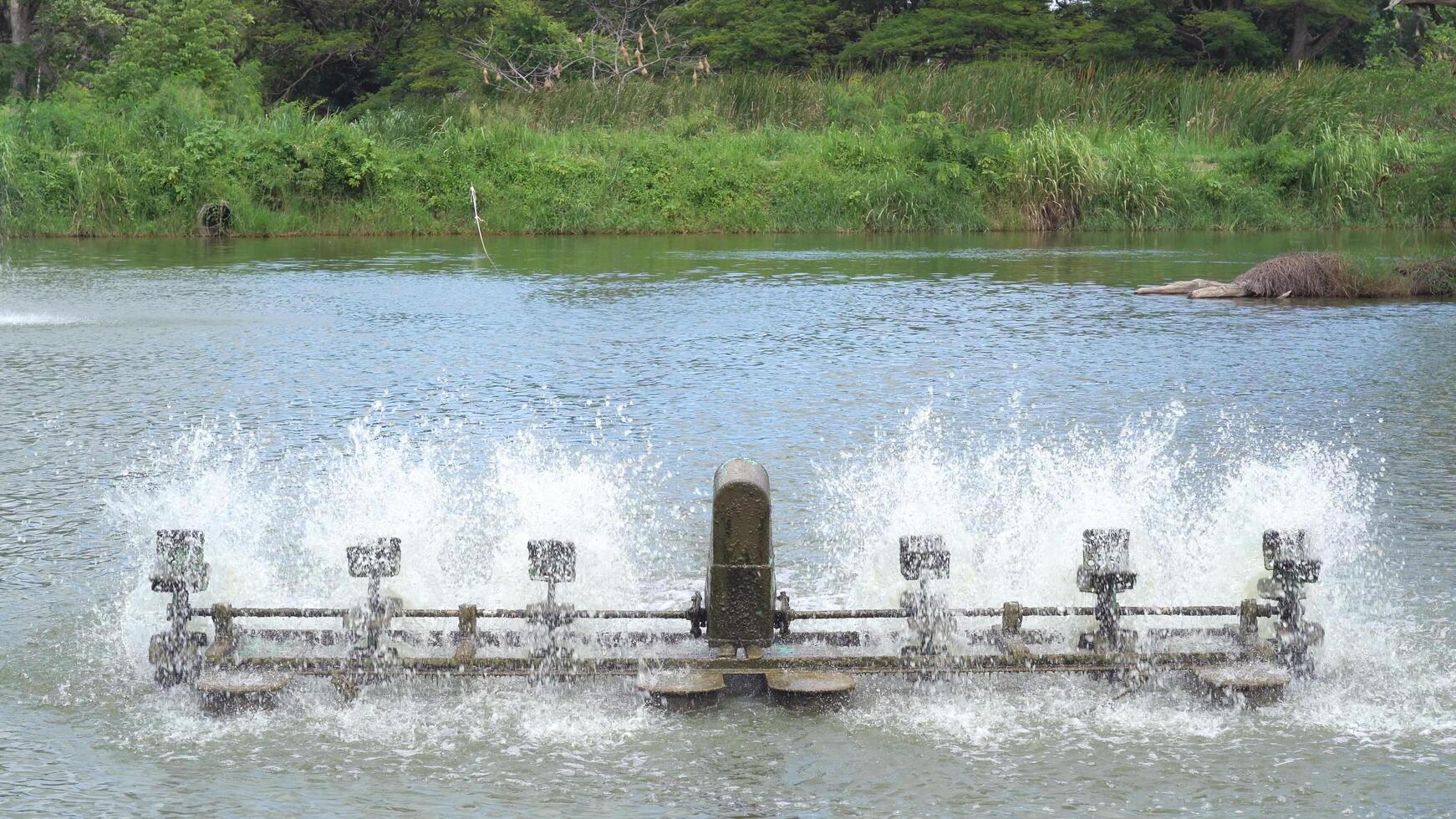 Water turbine for waste water treatment in pond photo