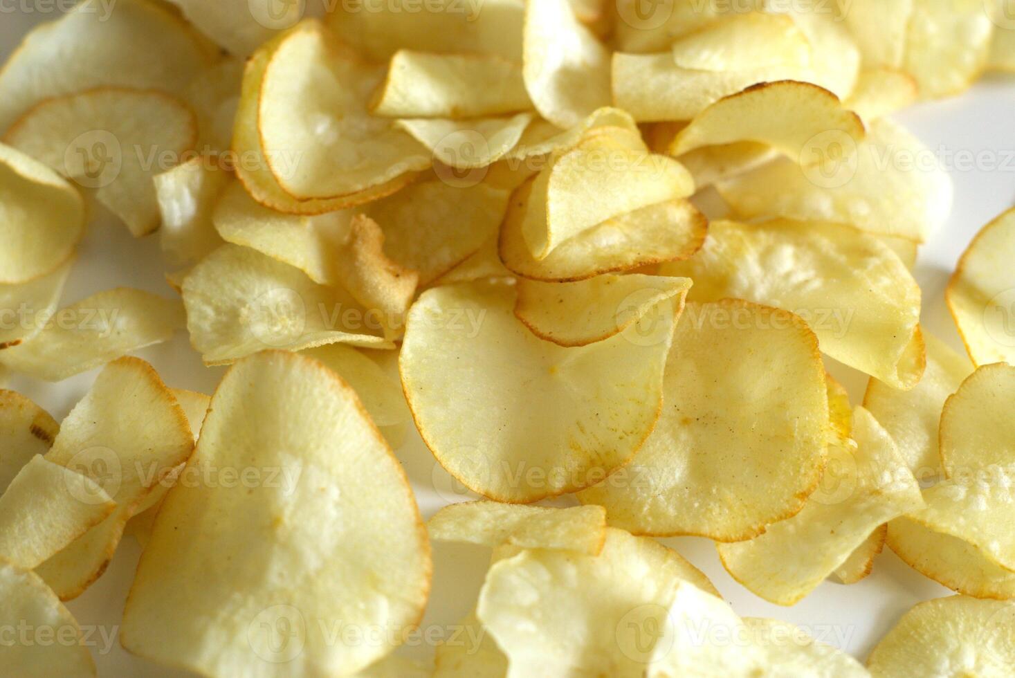 Close up of fried crispy cassava chips, traditional Indonesian snack photo