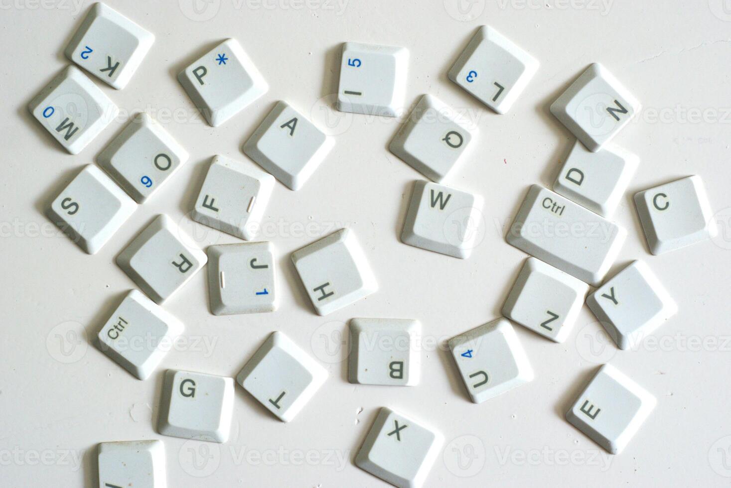 Scattered keyboard buttons on white background, illustration of keyboard typing photo