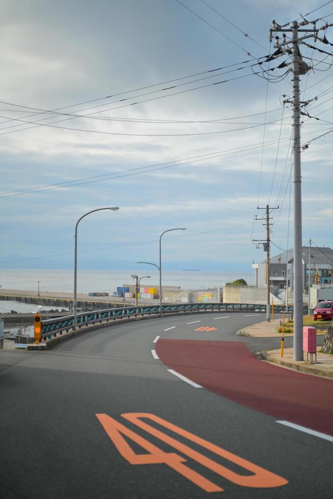 Deserted road by the harbor photo