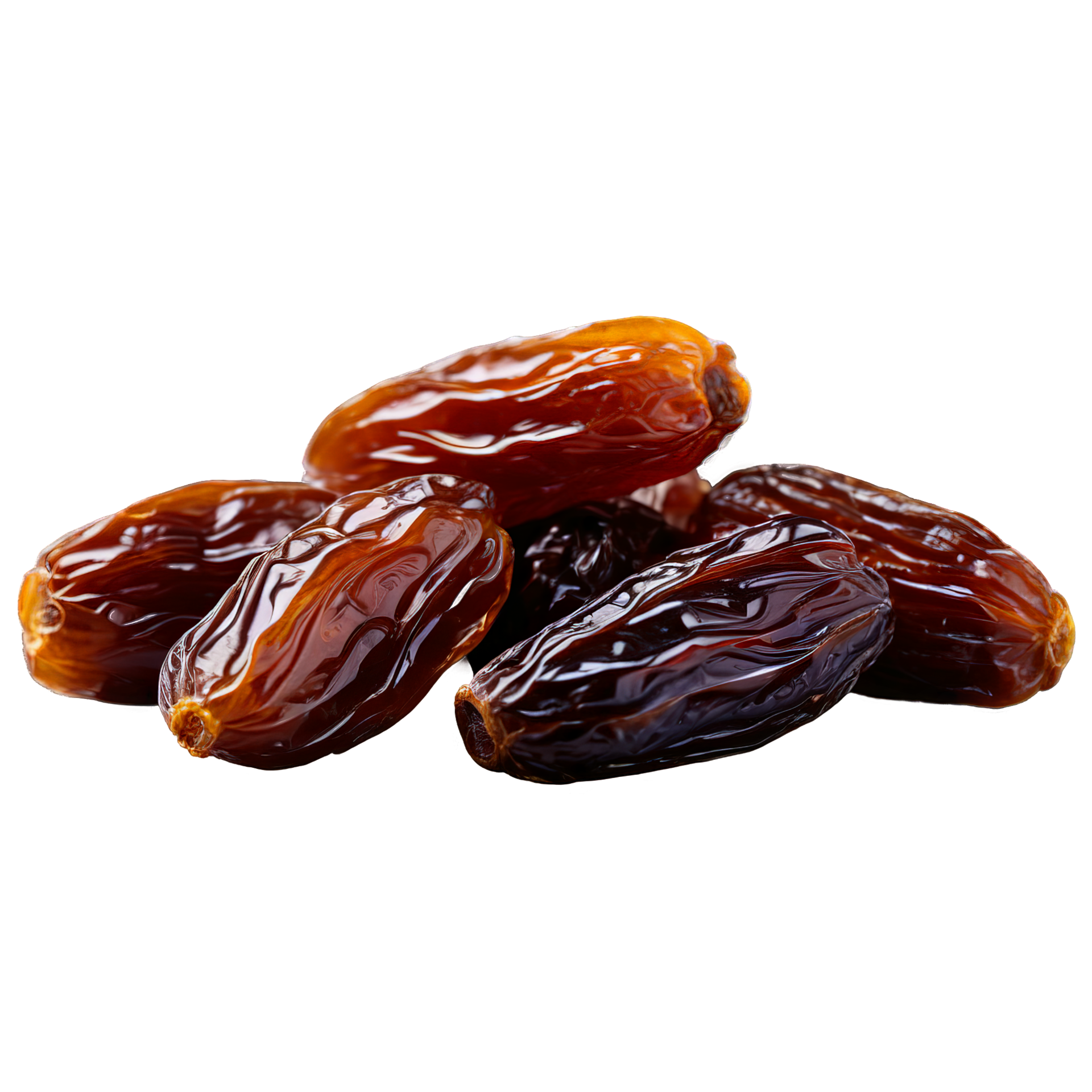 Dried dates wrinkled and elongated grouped in a small cluster on a