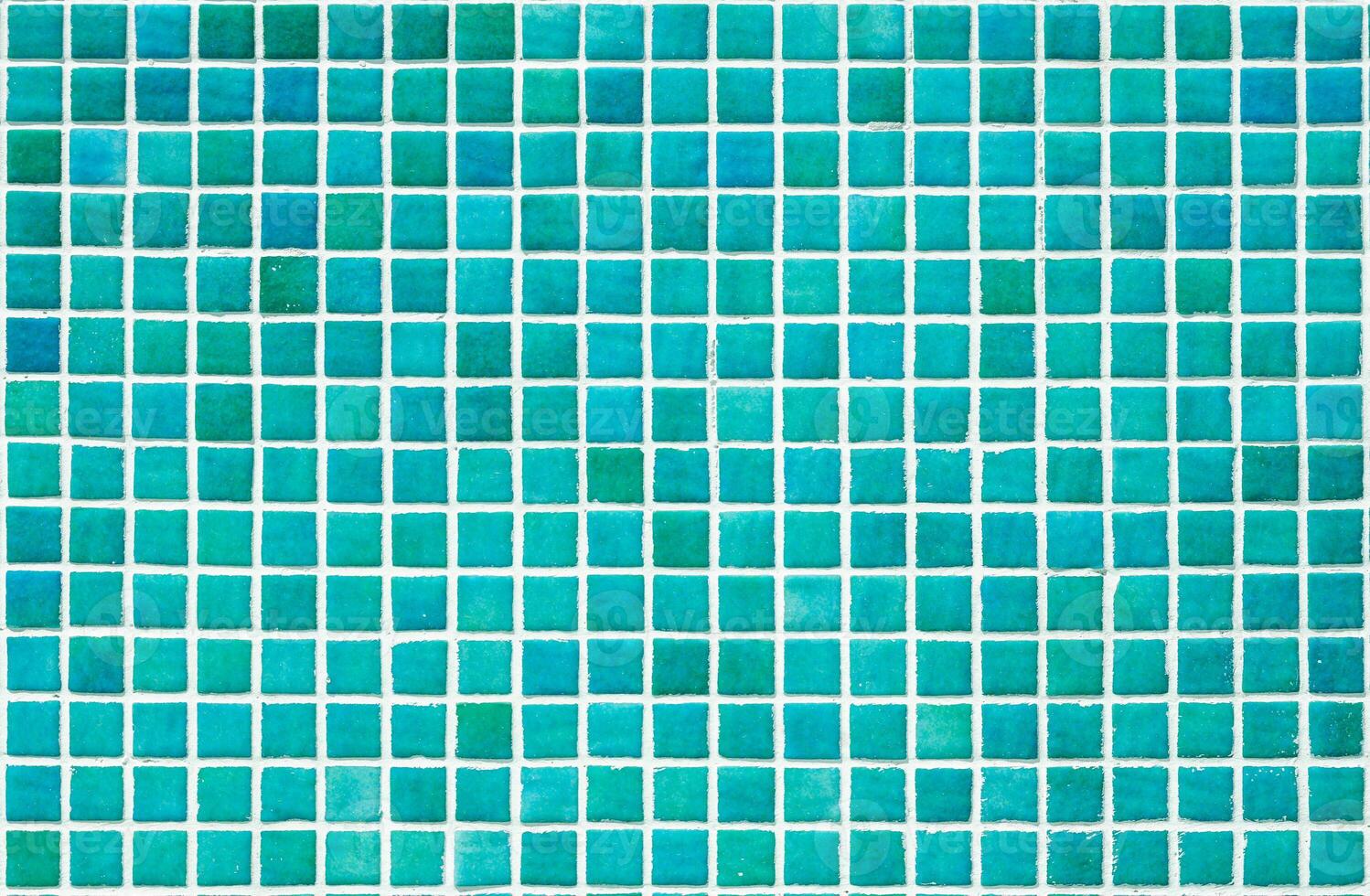 Texture of a wall covered with decorative brick-like tiles mosaic. Abstract background for design. photo