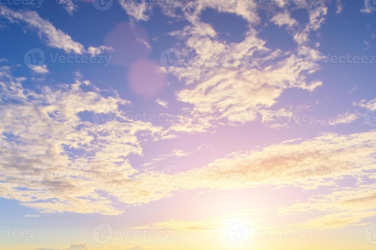 The rays of the sun breaking through the clouds in the evening or in the morning in the sunset or dawn sky. The concept of faith, hope for the best or good weather. photo