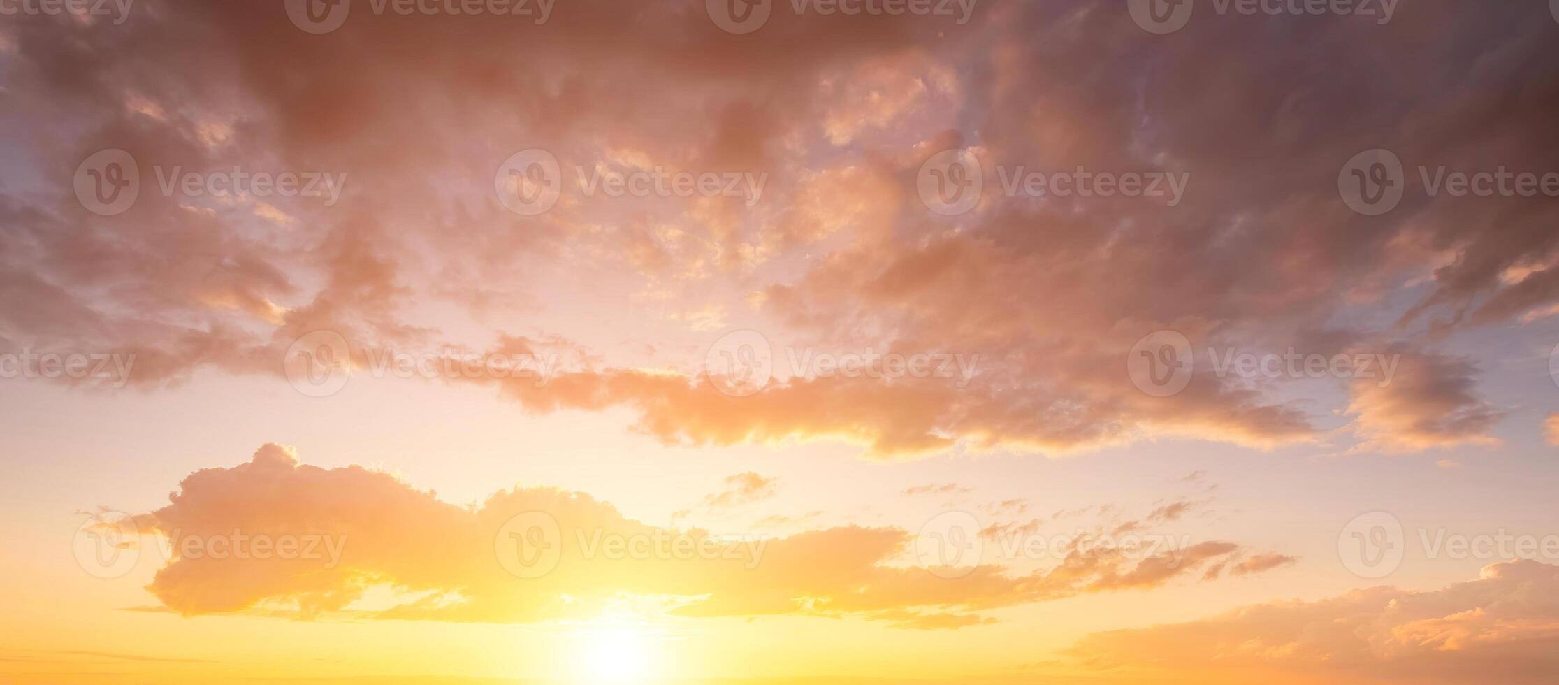 The rays of the sun breaking through the clouds in the evening or in the morning in the sunset or dawn sky. The concept of faith, hope for the best or good weather. photo
