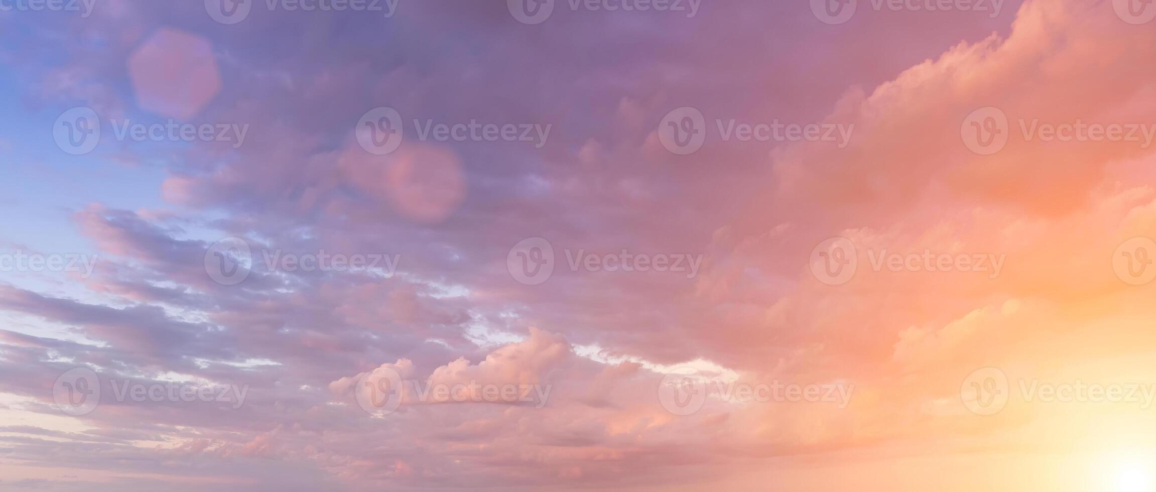 The rays of the sun breaking through the clouds in the evening or in the morning in the sunset or dawn sky. The concept of faith, hope for the best or good weather. photo