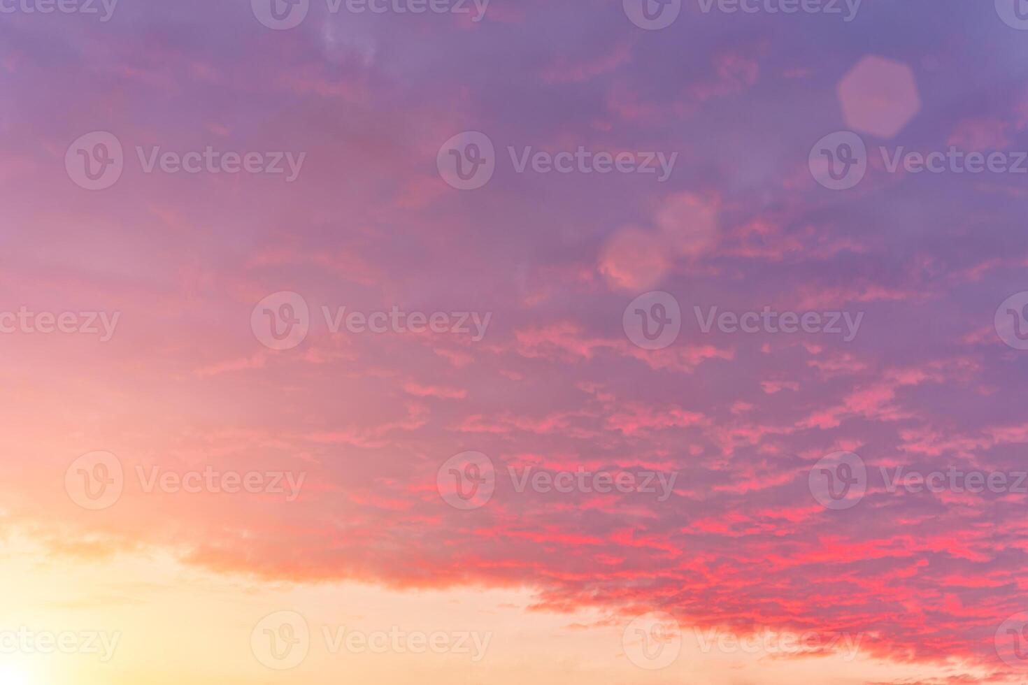 The rays of the sun breaking through the clouds in the evening or in the morning in the sunset or dawn sky. The concept of faith, hope for the best or good weather. photo