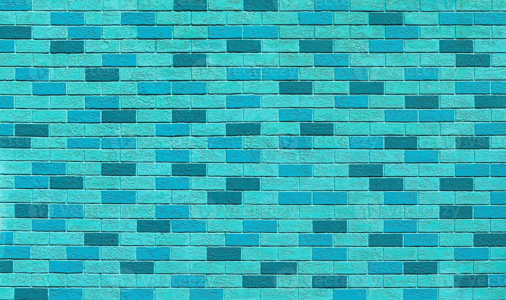 Texture of a wall covered with decorative brick-like tiles. Abstract background. photo