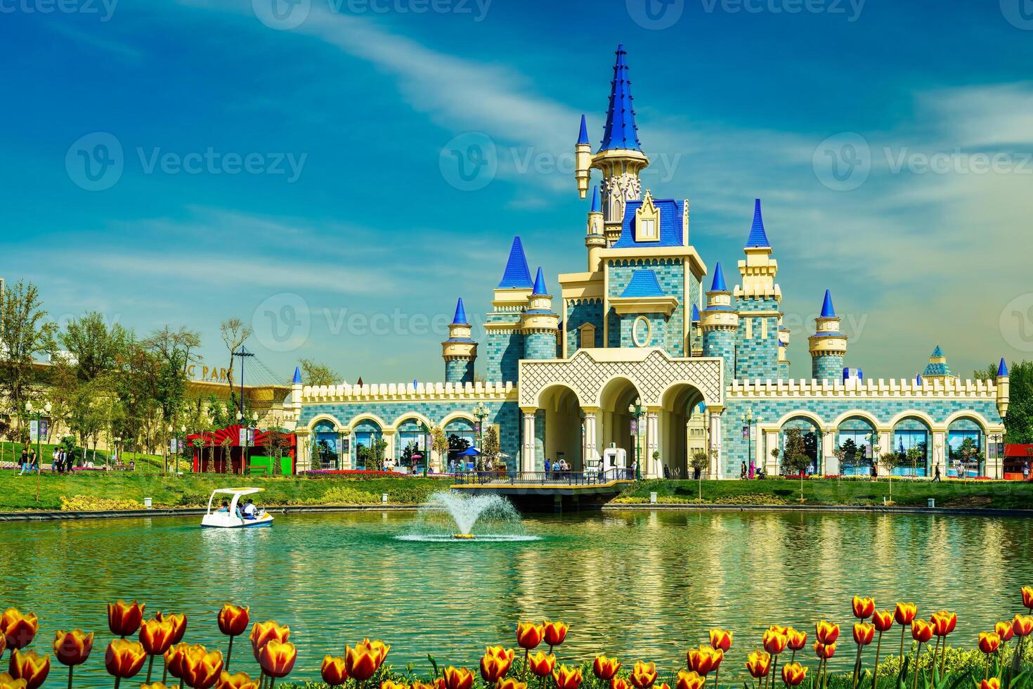 TASHKENT, UZBEKISTAN - APRIL 15, 2023 Magic City amusement park on a daytime. photo