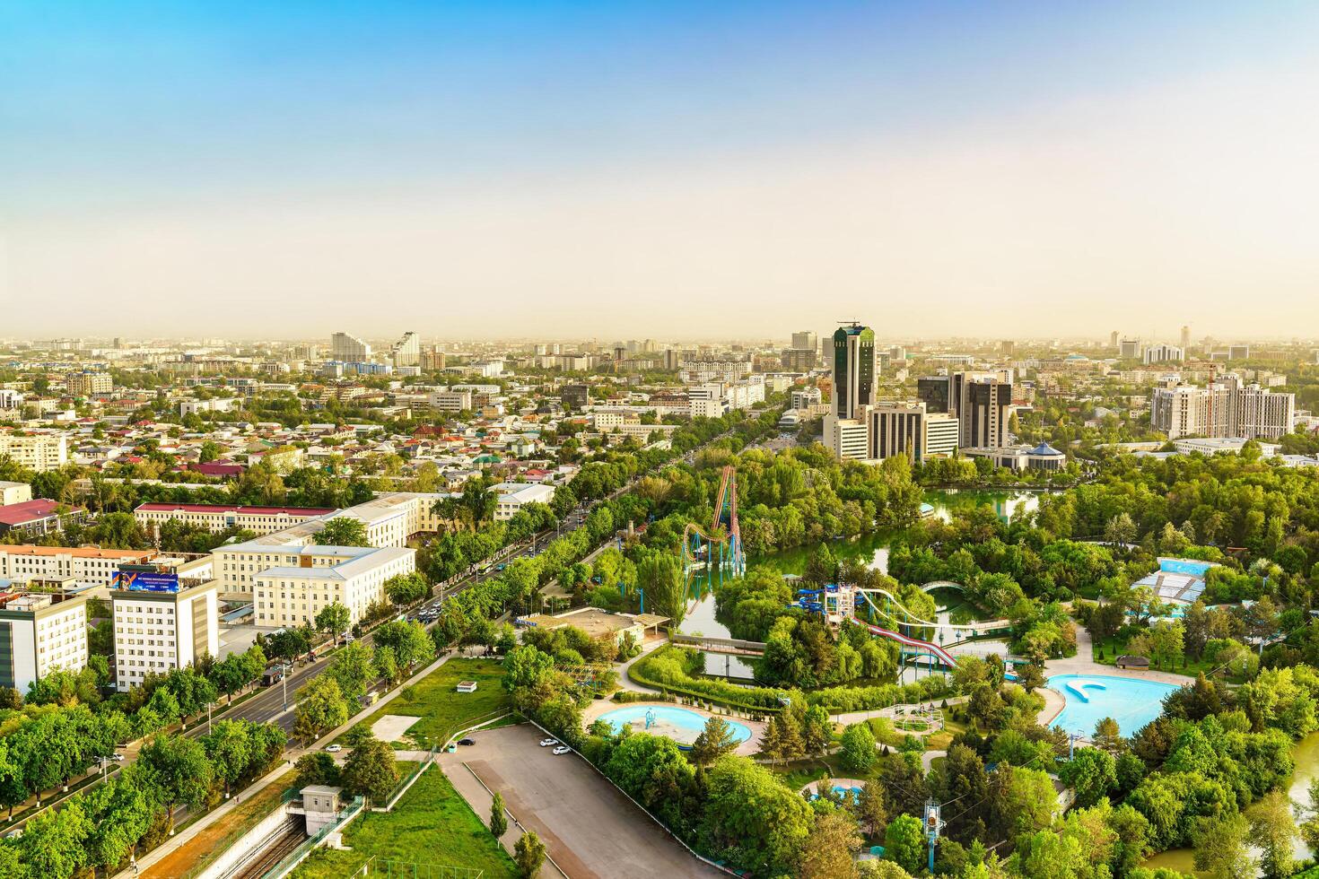 Uzbekistan, Tashkent - April 24, 2023 Top view from the observation deck on the Tashkent TV tower to the central part of the city during the daytime in spring. photo