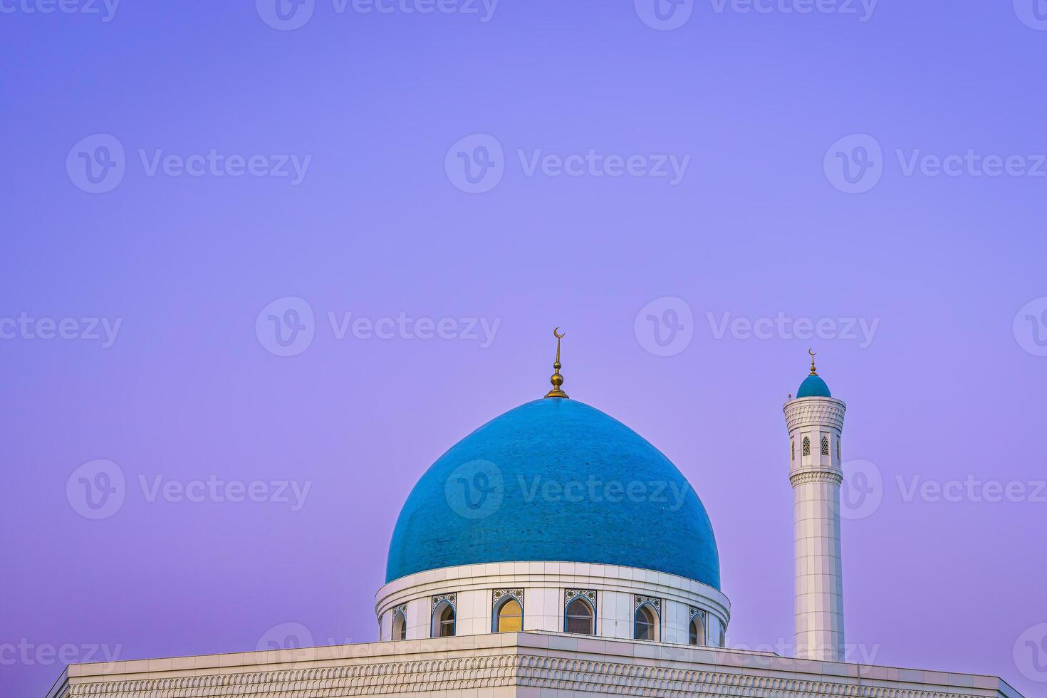 The Minor Mosque covered with white marble in the center of Tashkent at sunset. photo